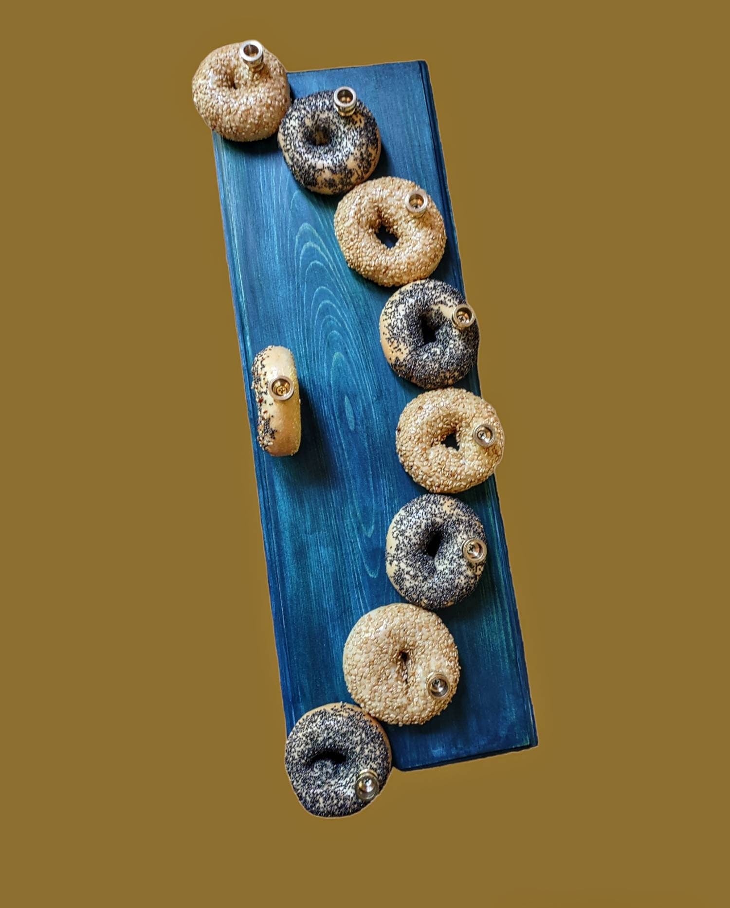 Bagel Lover's Menorah — nine real shellacked bagels on a long stained wood base | Judaica Square Lakewood (view 4)