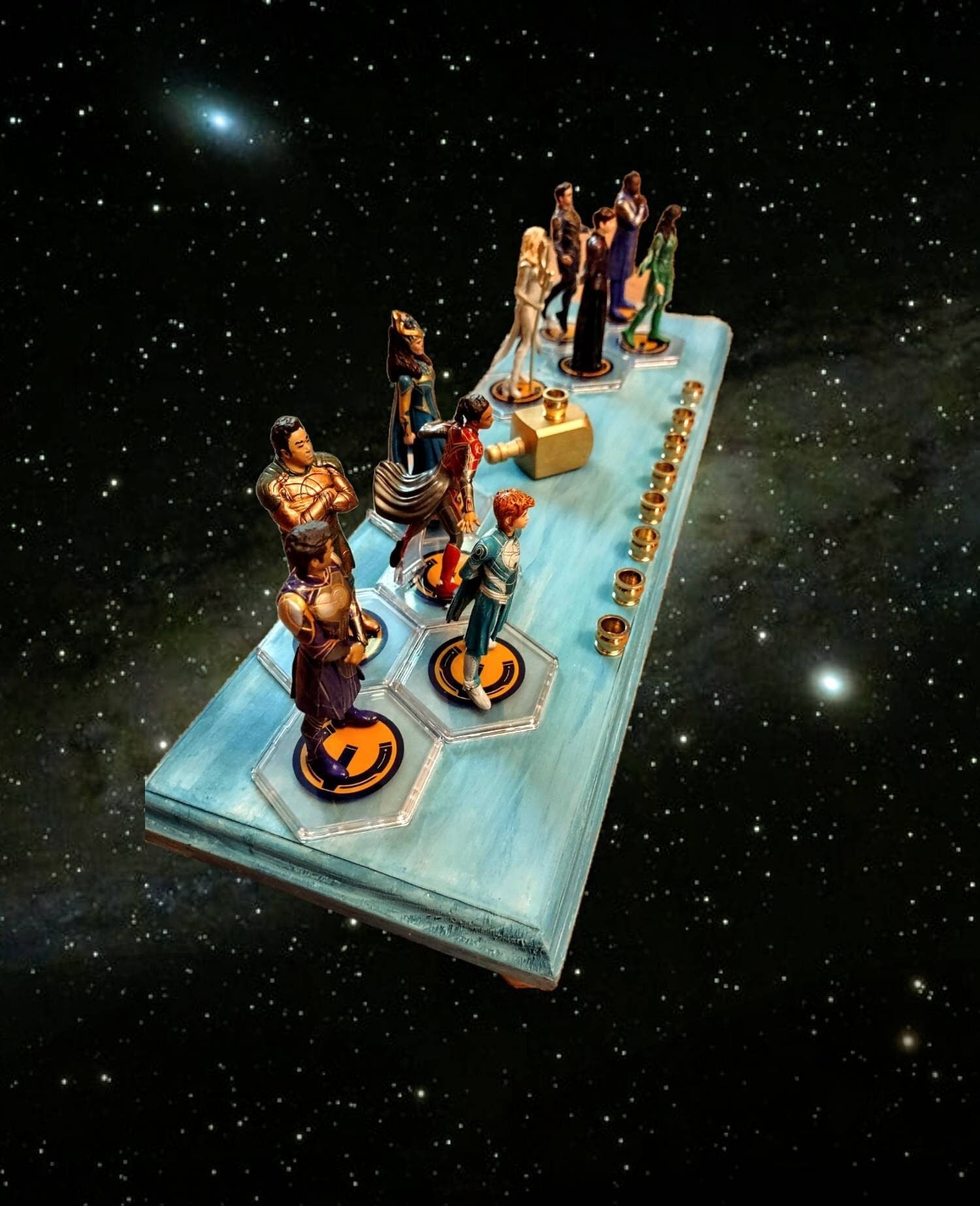 Eternals Menorah — row of superhero figures on a stained wood base with candle cups | Judaica Square Lakewood (view 4)