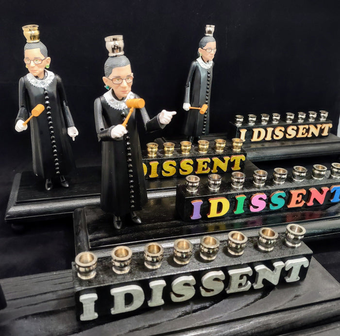 RBG I Dissent menorah — Ruth Bader Ginsburg figure in sparkly collar with letter tiles | Judaica Square Lakewood