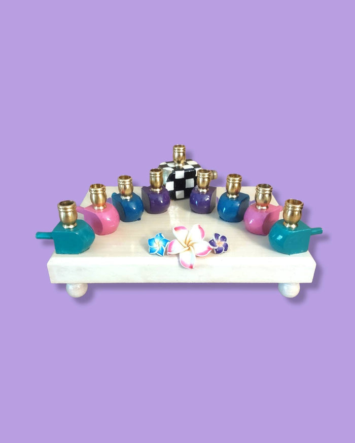 Jewel Tone Menorah — checkered painted dreidels with tropical flowers | Judaica Square Lakewood