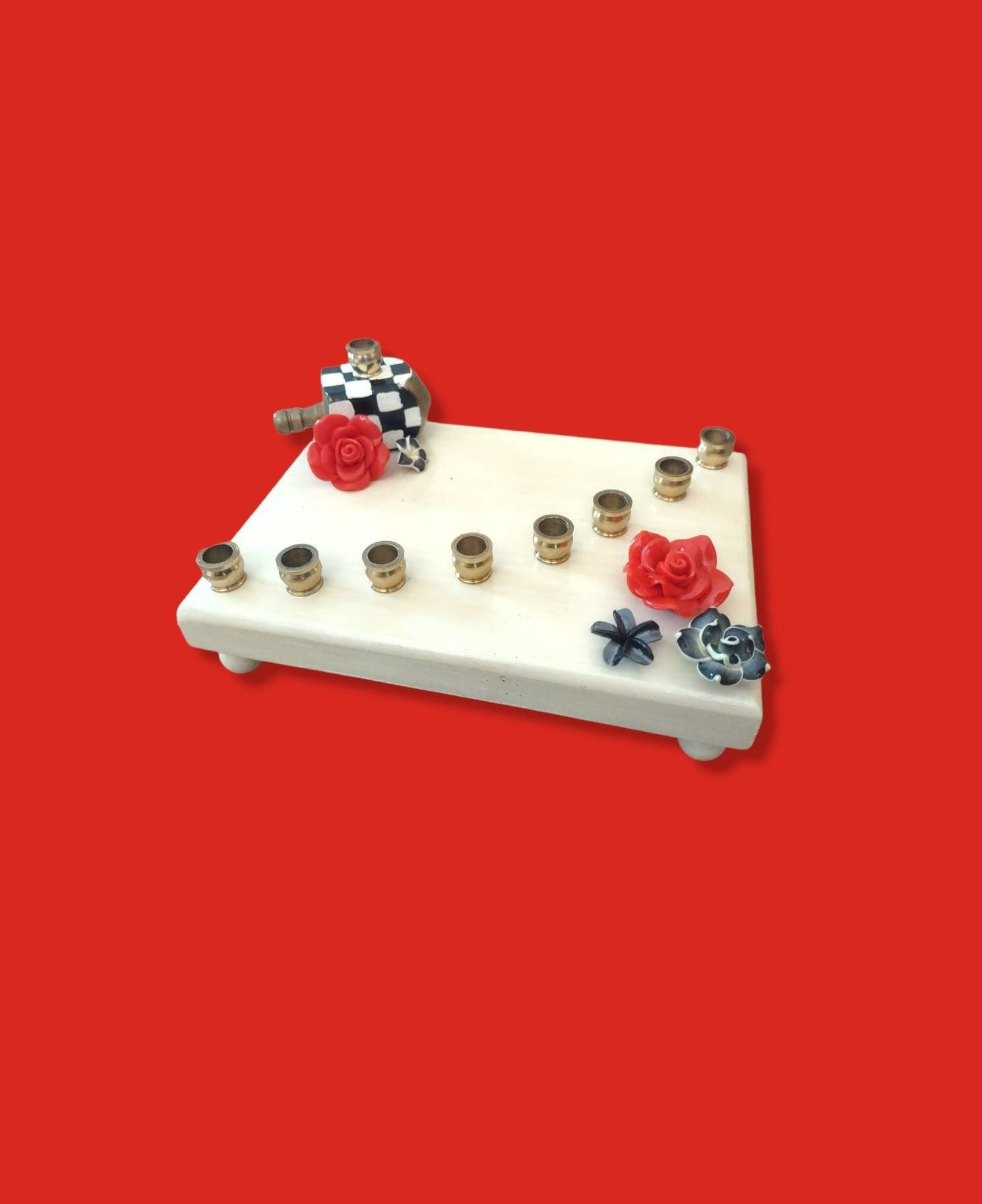 Checkerboard flower menorah — painted checks with red silicone blooms and brass cups | Judaica Square Lakewood (view 3)