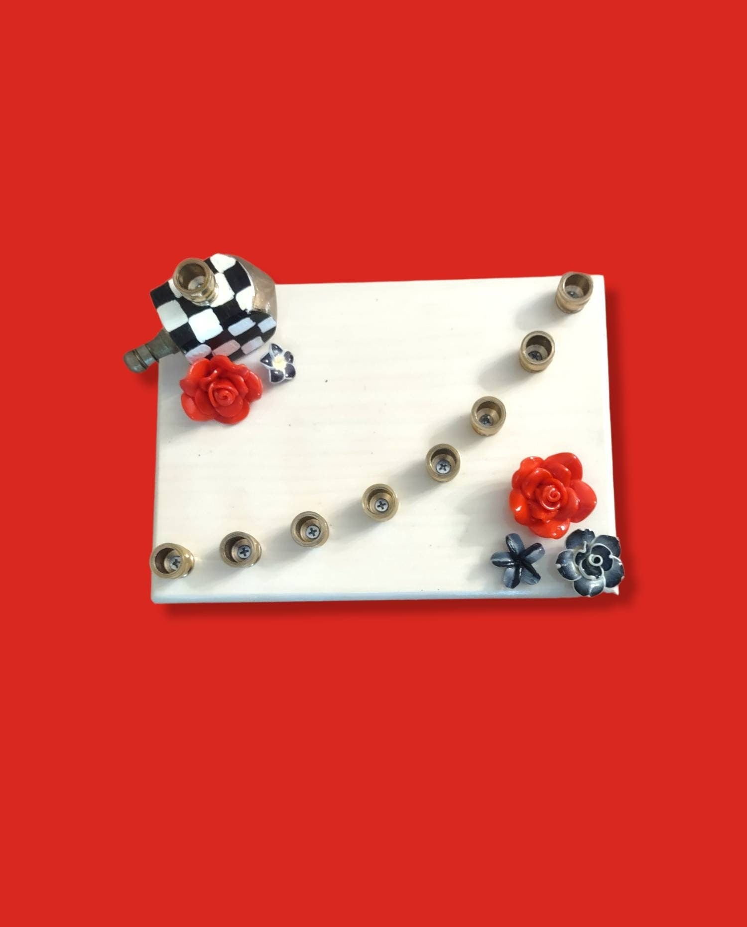 Checkerboard flower menorah — painted checks with red silicone blooms and brass cups | Judaica Square Lakewood (view 4)