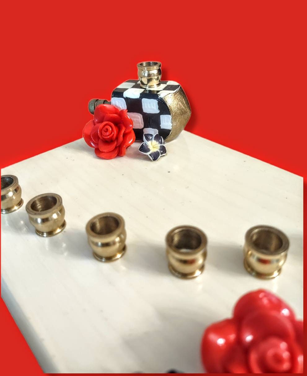 Checkerboard flower menorah — painted checks with red silicone blooms and brass cups | Judaica Square Lakewood (view 5)
