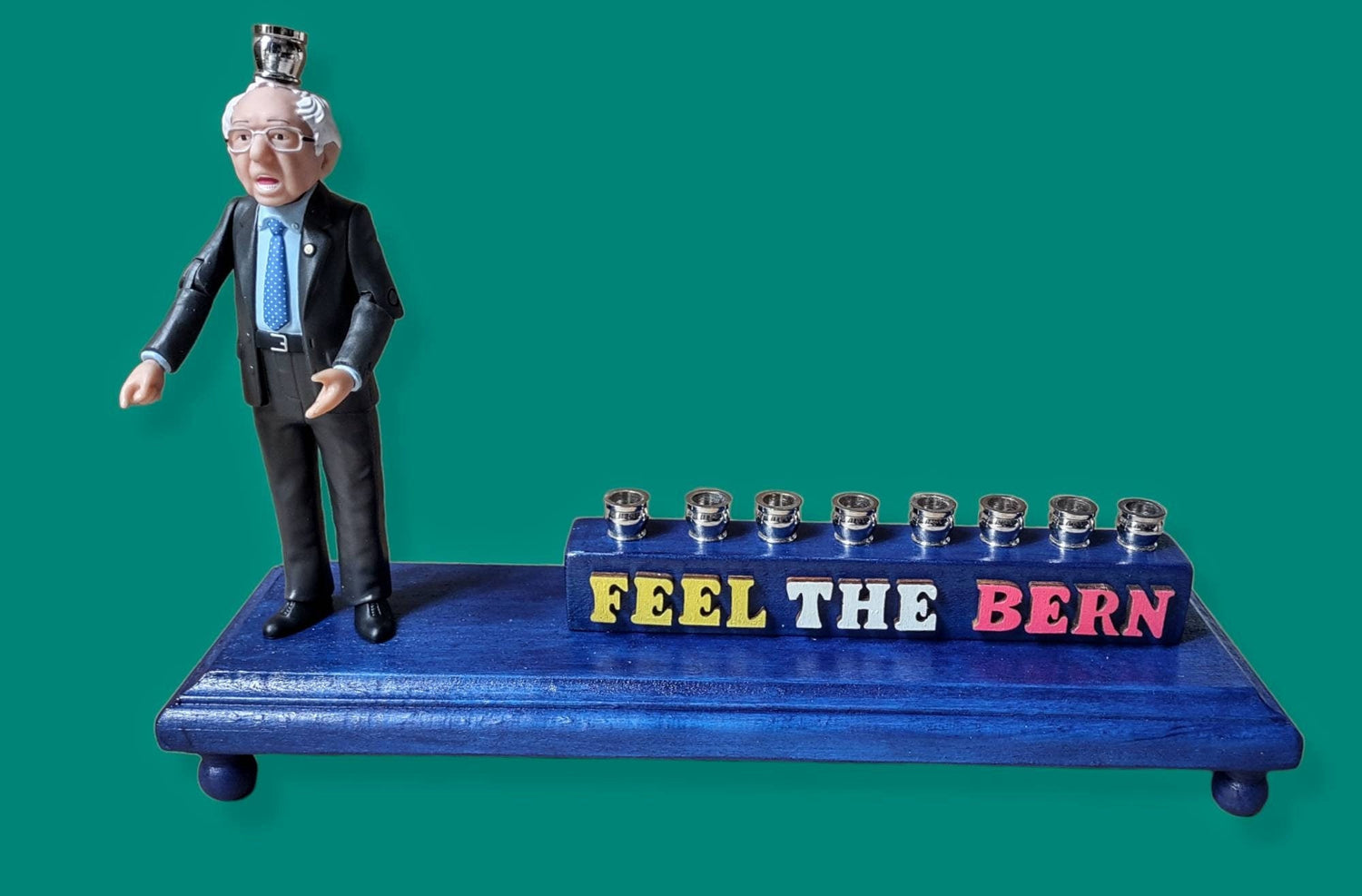 Feel the Bern menorah — Bernie Sanders figure with wood letters and nickel cups | Judaica Square Lakewood (view 2)