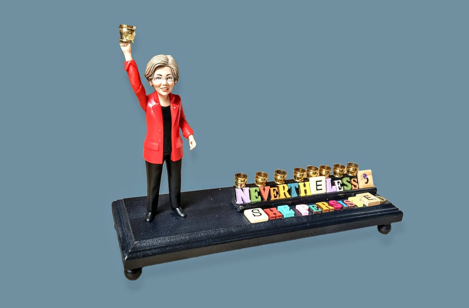 Elizabeth Warren menorah — action figure with scrabble tile quote and brass cups | Judaica Square Lakewood (view 3)