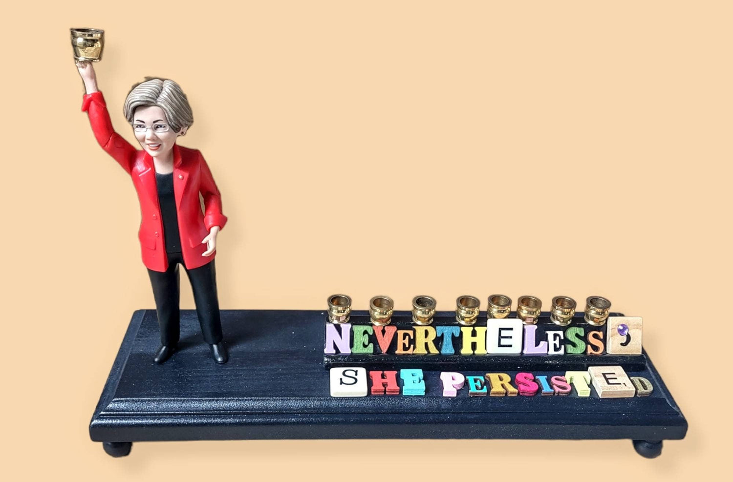 Elizabeth Warren menorah — action figure with scrabble tile quote and brass cups | Judaica Square Lakewood (view 2)