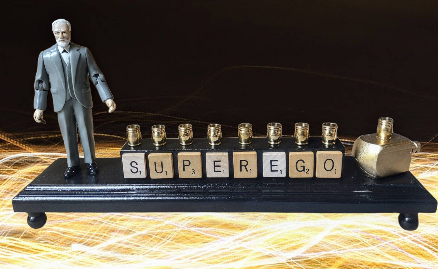 Sigmund Freud Menorah — Freud figure with SUPEREGO letter tiles and gold cups | Judaica Square Lakewood (view 3)