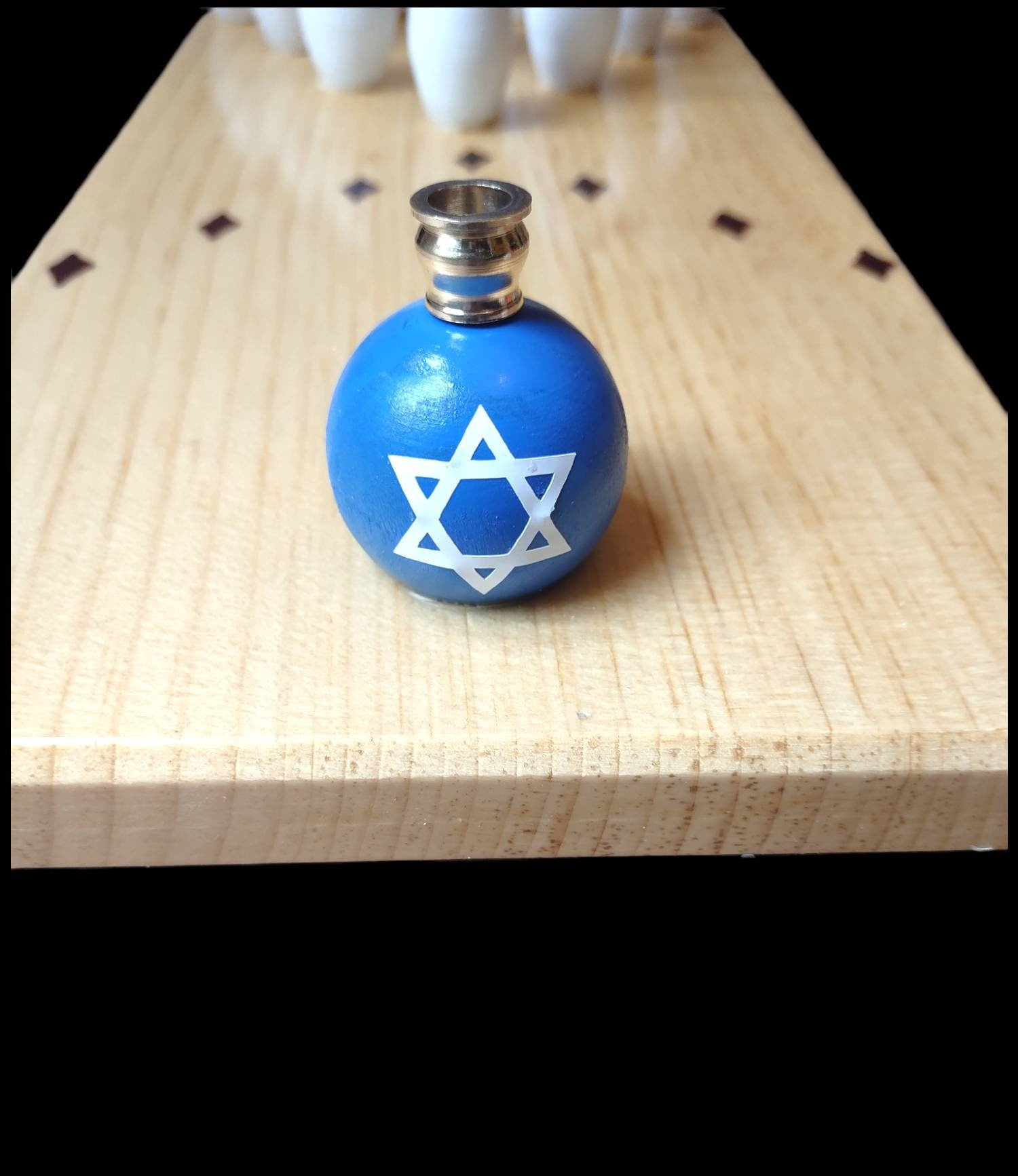 Bowling menorah — stained wood lane with painted pins and bowling ball shamash | Judaica Square Lakewood (view 5)