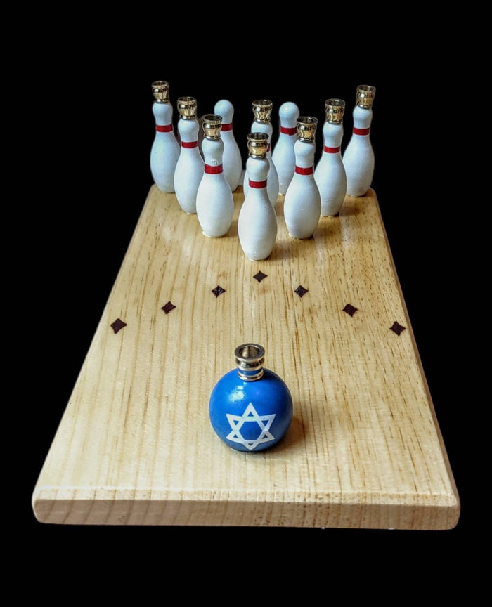Bowling menorah — stained wood lane with painted pins and bowling ball shamash | Judaica Square Lakewood