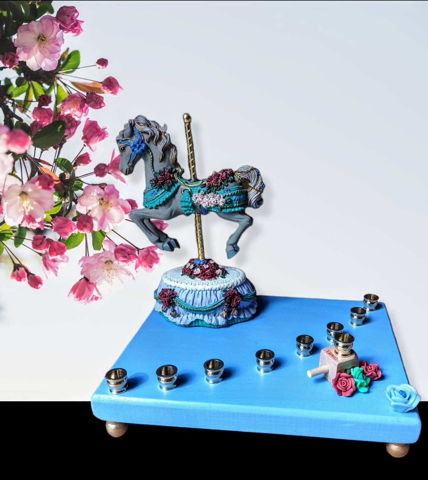 Carousel menorah — vintage musical horse on painted base with silicone flowers | Judaica Square Lakewood (view 4)