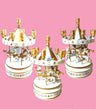Carousel music box menorah — wind-up carousel with moving horses and gold candle cups | Judaica Square Lakewood