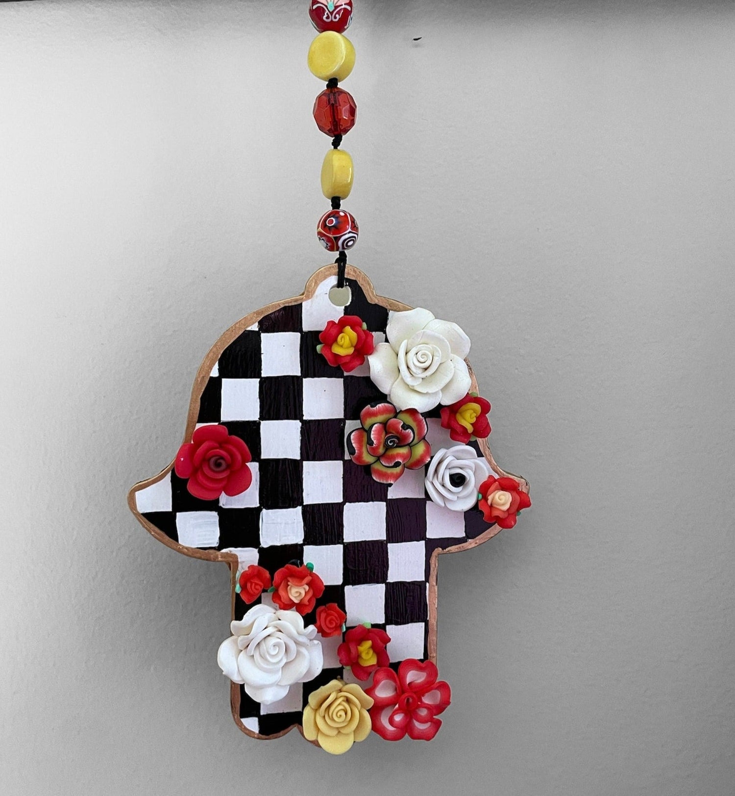 Checkerboard hamsa — wood wall hanging with silicone flowers and beads | Judaica Square Lakewood (view 2)
