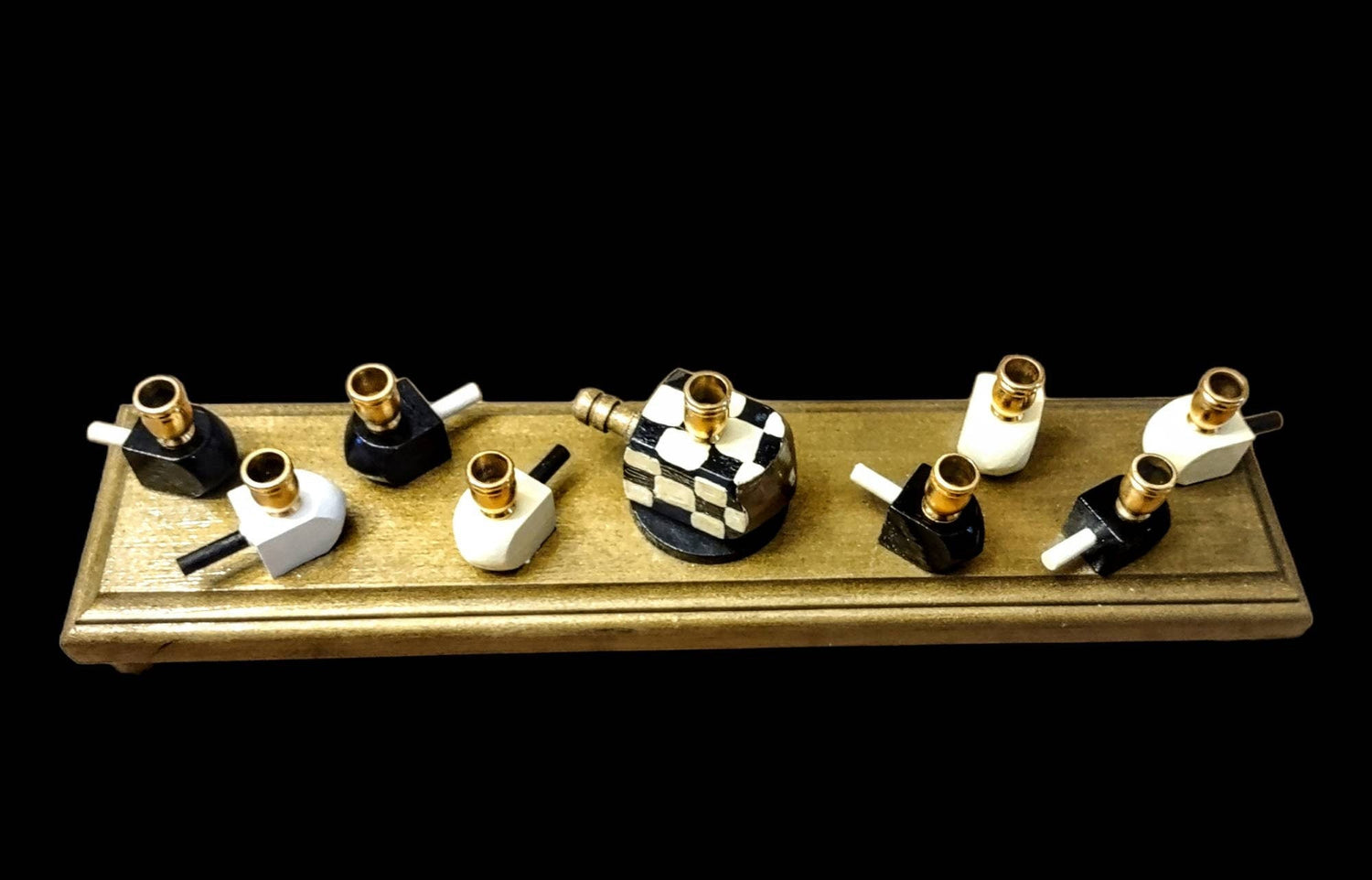 Checkerboard dreidel menorah — black and white checked wood dreidels with gold cups | Judaica Square Lakewood (view 2)