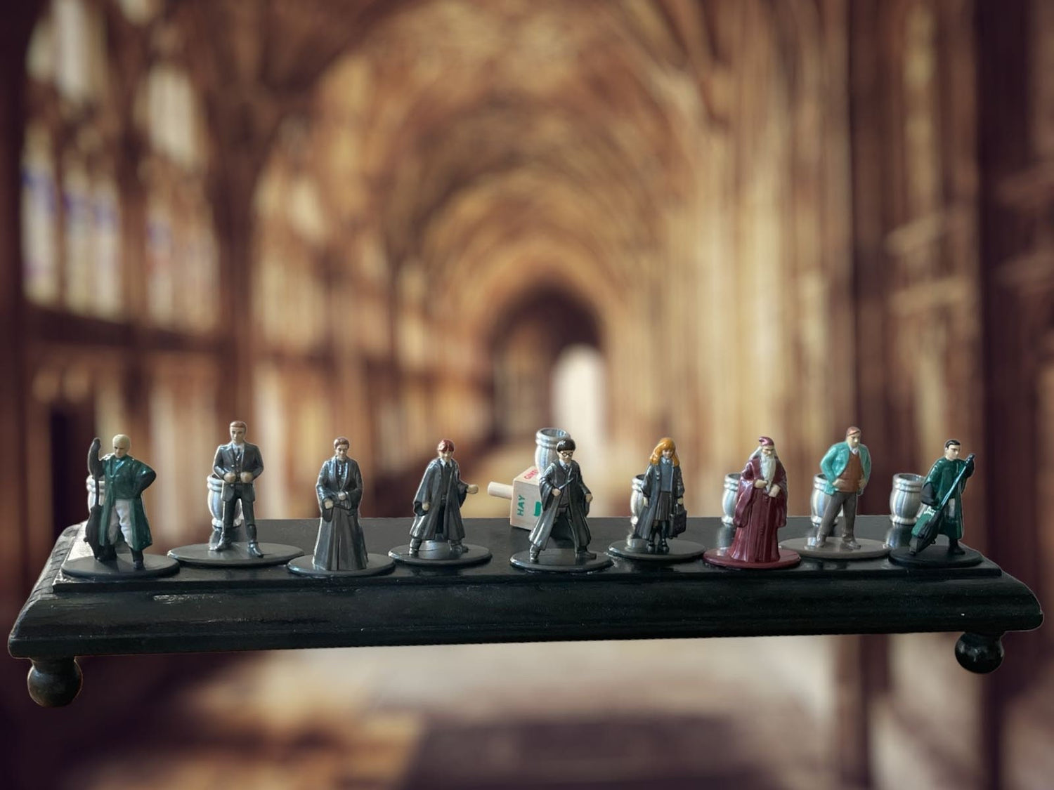 Harry Potter Collector Menorah — nine wizard figures on a long wood plaque | Judaica Square Lakewood (view 2)