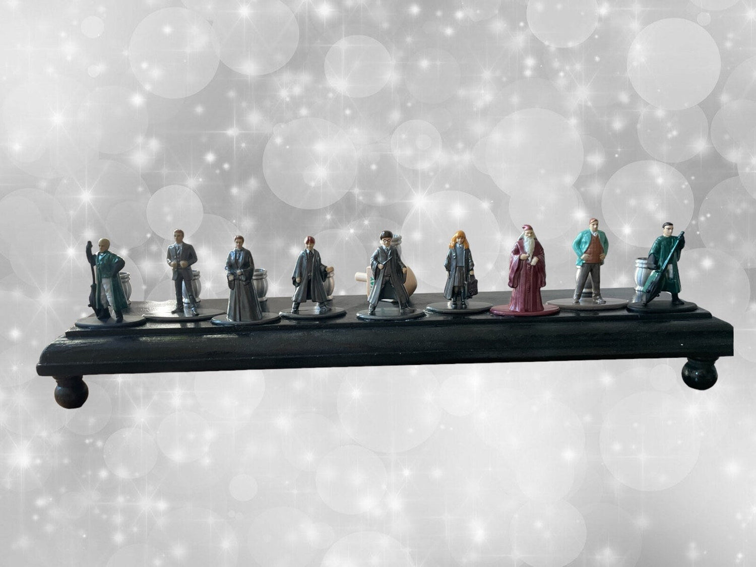 Harry Potter Collector Menorah — nine wizard figures on a long wood plaque | Judaica Square Lakewood (view 3)