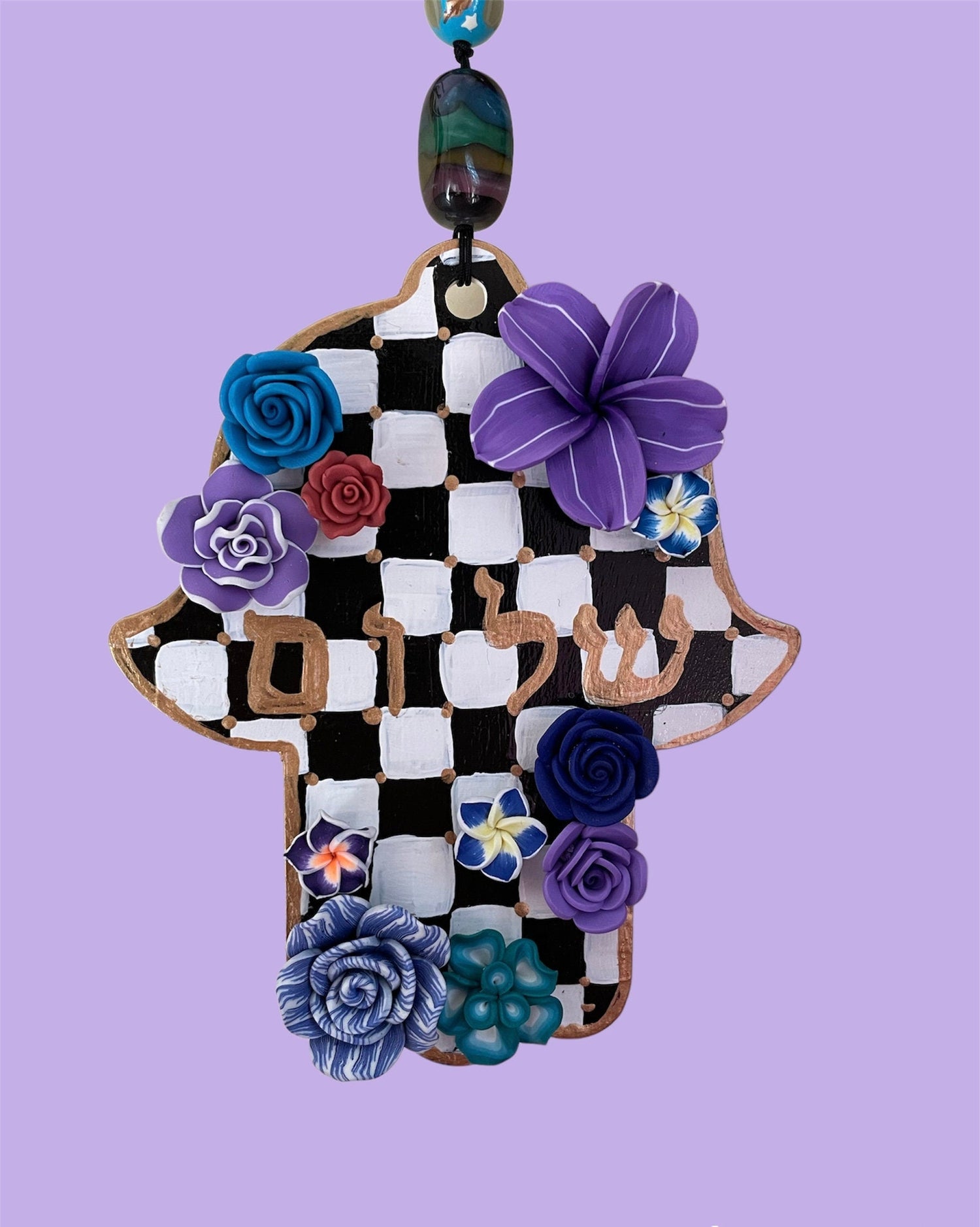 Shalom hamsa — purple and blue checkered wood hanging with flowers | Judaica Square Lakewood (view 2)
