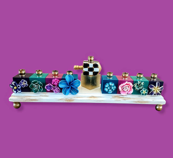 Tropical checkerboard menorah — painted flowers on jewel-colored blocks with brass cups | Judaica Square Lakewood