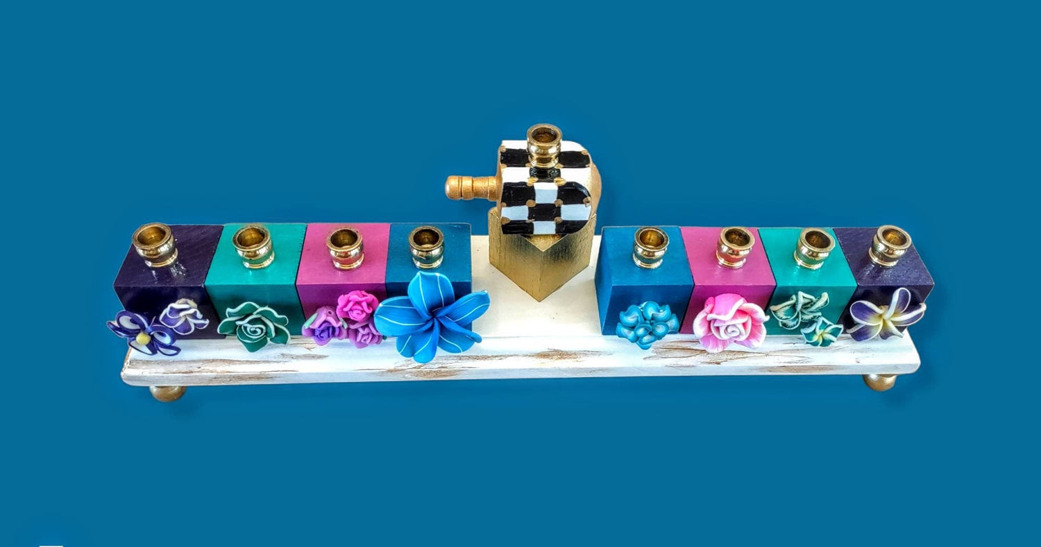 Tropical checkerboard menorah — painted flowers on jewel-colored blocks with brass cups | Judaica Square Lakewood (view 2)