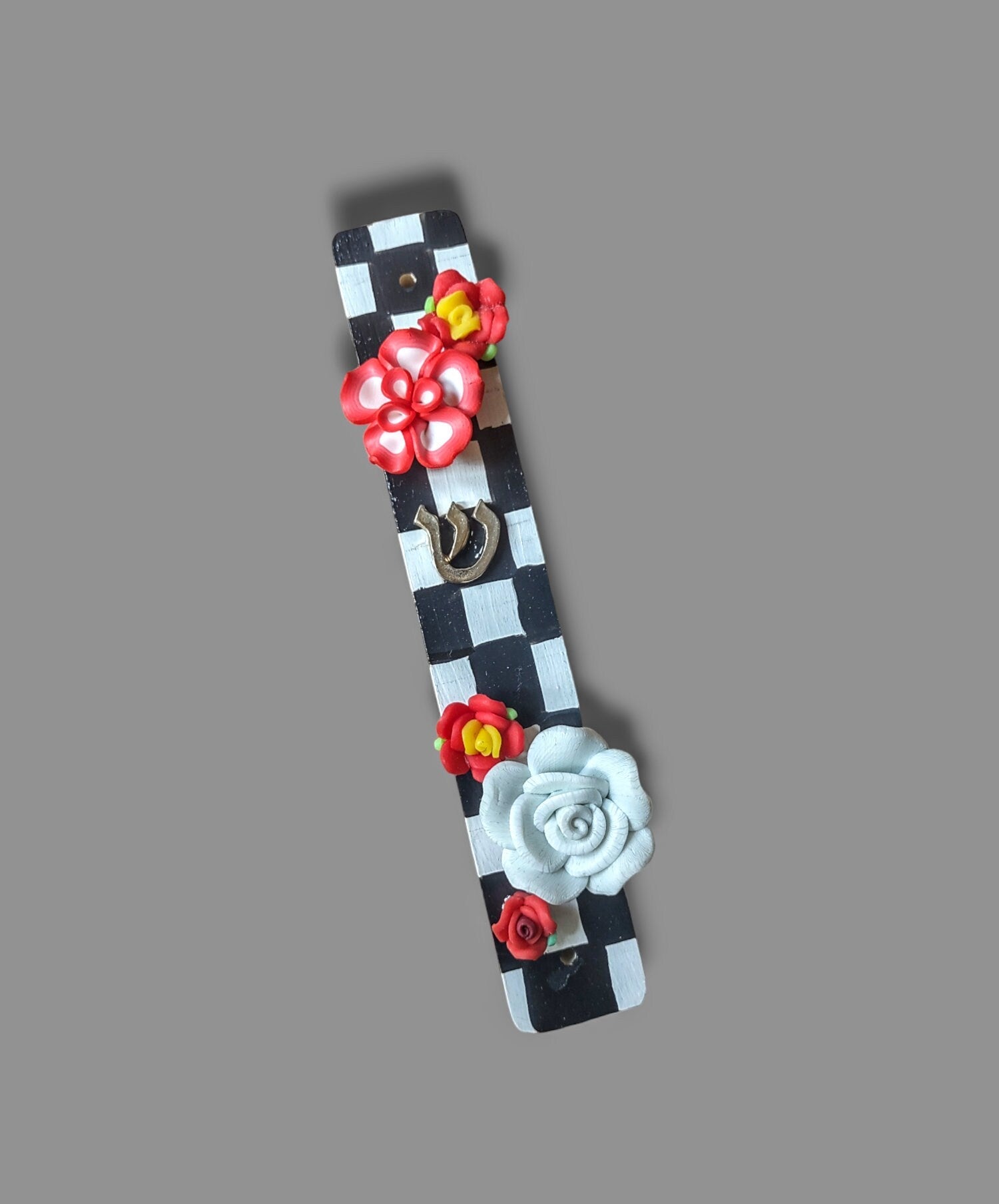 Checkerboard mezuzah case with silicone flowers — painted checks and raised blooms | Judaica Square Lakewood (view 4)