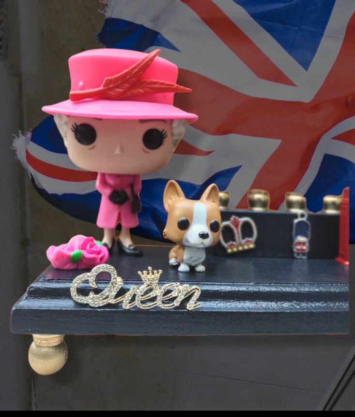 Queen Elizabeth Menorah — royal figure with corgi and flower charms | Judaica Square Lakewood (view 10)