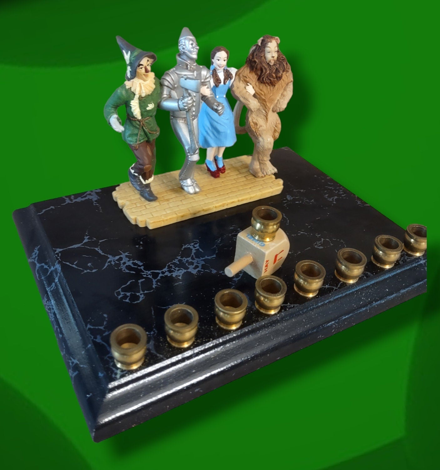 Wizard of Oz resin menorah — repurposed resin ornament on painted wood plaque with brass cups | Judaica Square Lakew (view 2)