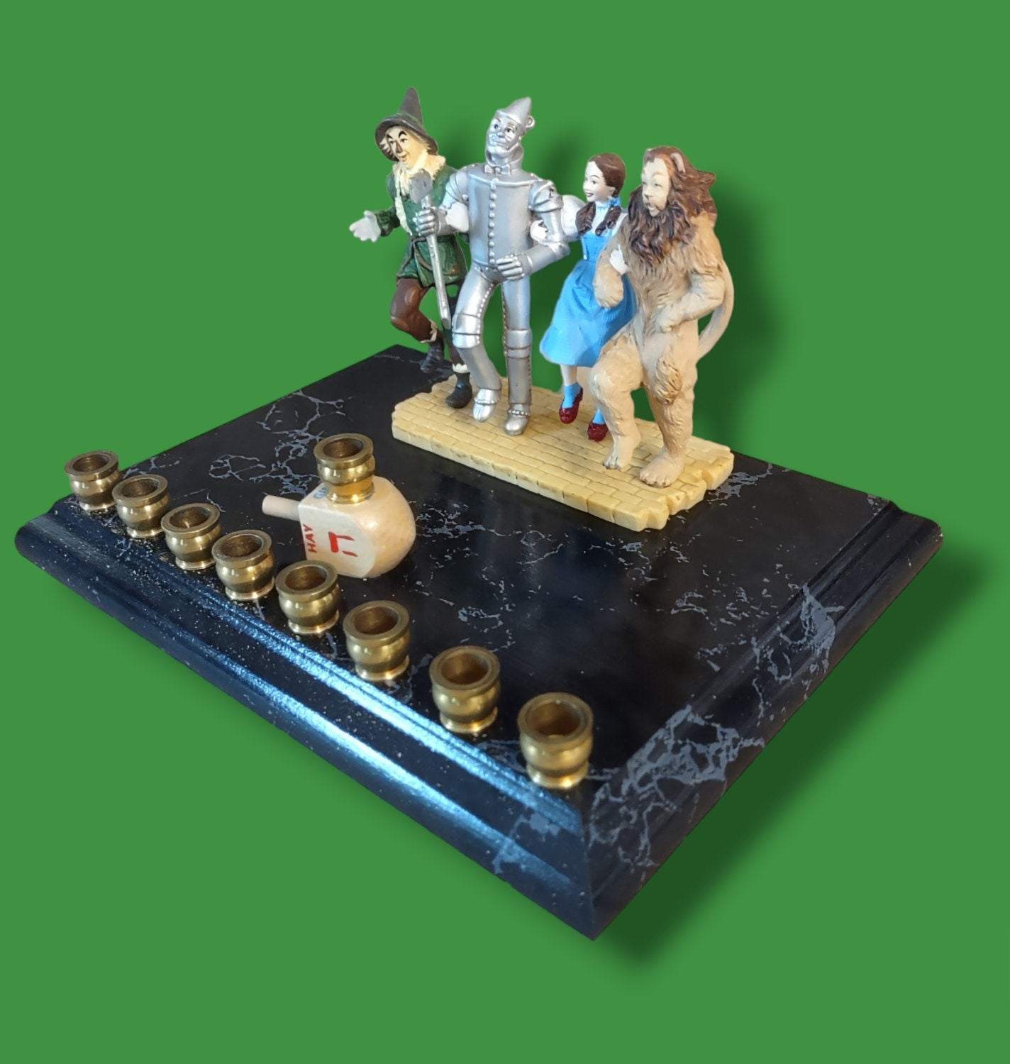 Wizard of Oz resin menorah — repurposed resin ornament on painted wood plaque with brass cups | Judaica Square Lakew (view 4)