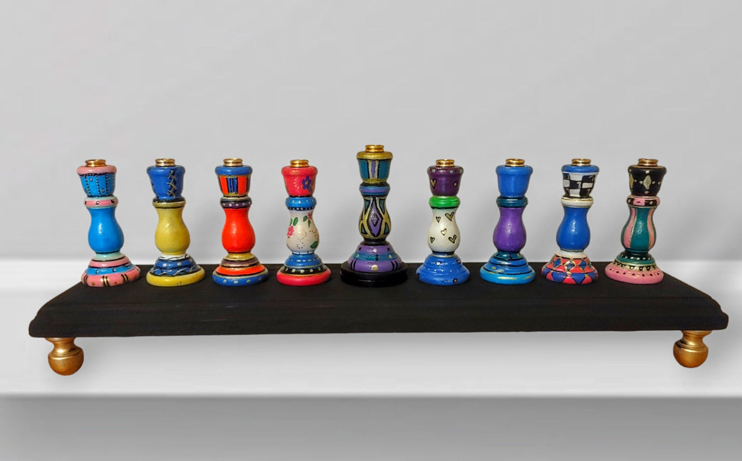 Tapered candlestick menorah — hand-painted checkerboard holders on a 16-inch black base | Judaica Square Lakewood (view 2)