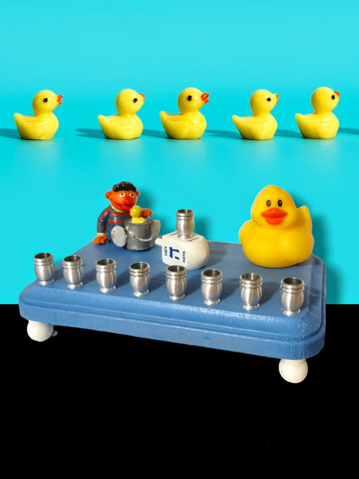 Rubber Ducky Menorah — Ernie and yellow duck on blue base with gold cups | Judaica Square Lakewood