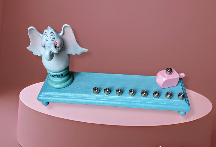 Horton Menorah — elephant figure with pink dreidel and brass cups | Judaica Square Lakewood