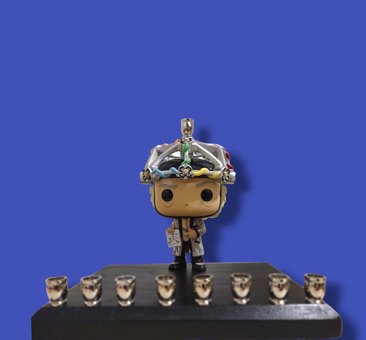 Back to the Future menorah — vinyl Doc figure with contraption and brass cups | Judaica Square Lakewood (view 3)