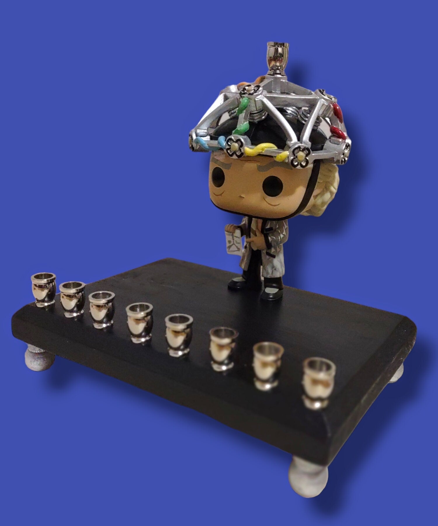 Back to the Future menorah — vinyl Doc figure with contraption and brass cups | Judaica Square Lakewood (view 2)