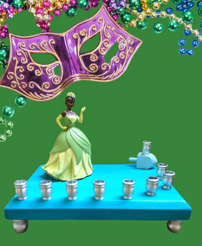Tiana menorah — Princess and the Frog figure in green gown with aluminum cups | Judaica Square Lakewood