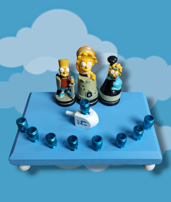 Simpsons kids menorah — Bart, Lisa and Maggie chess figures with blue aluminum cups | Judaica Square Lakewood