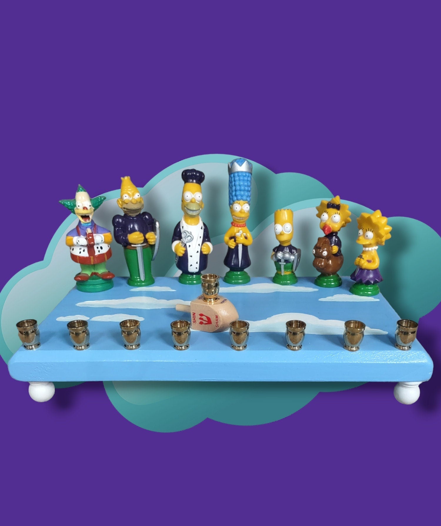 Simpsons Menorah — Homer and family chess figures on a wood plaque | Judaica Square Lakewood (view 4)
