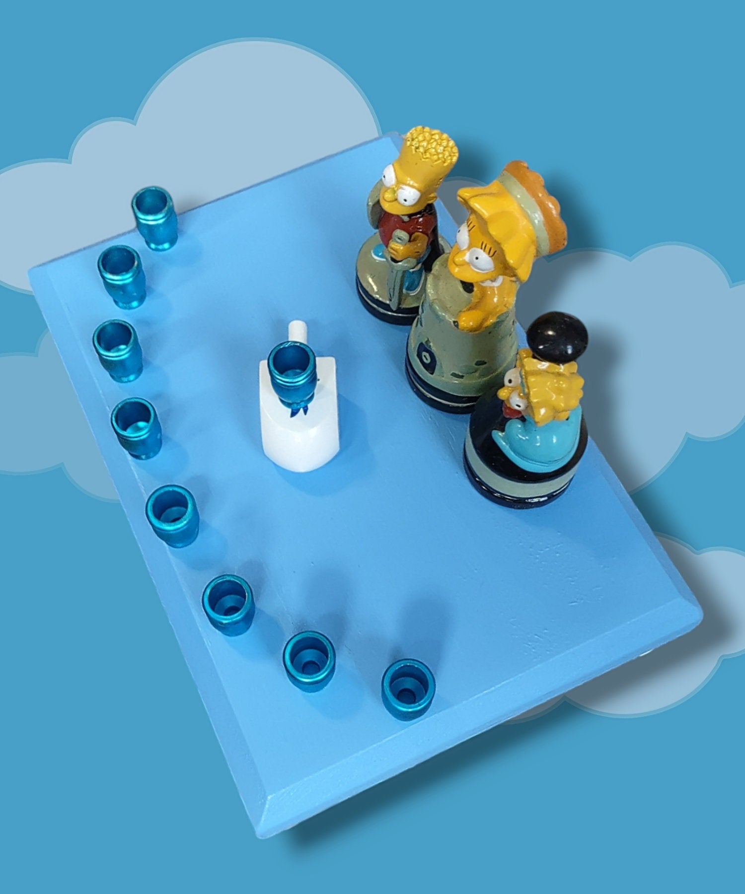 Simpsons kids menorah — Bart, Lisa and Maggie chess figures with blue aluminum cups | Judaica Square Lakewood (view 3)