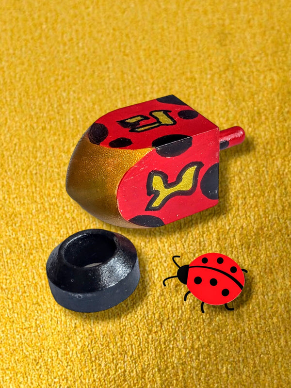 Hand-Painted Ladybug Dreidel — wood dreidel with ladybug art on stand | Judaica Square Lakewood