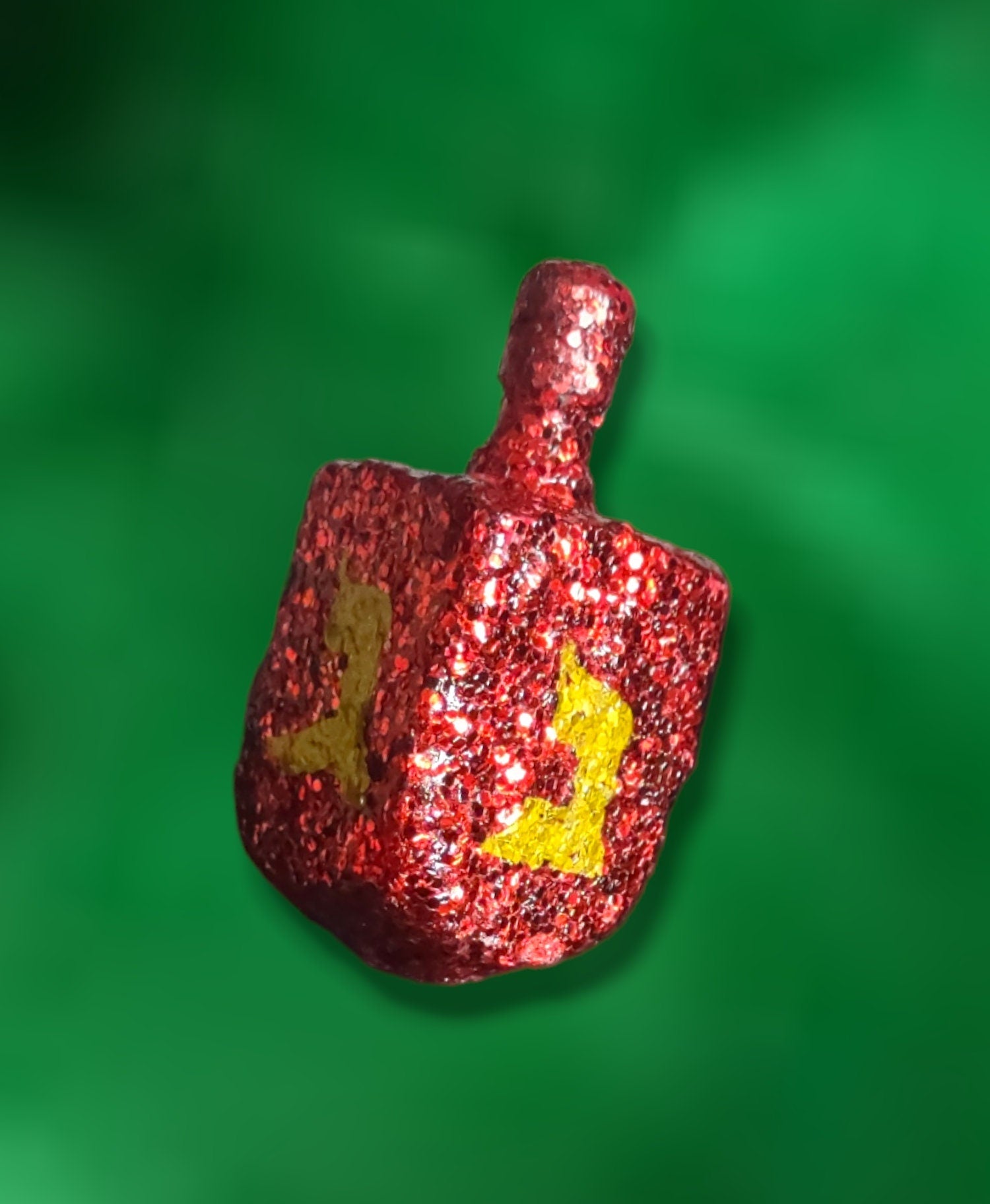 Ruby Glitter Dreidel — ruby red glittered wood dreidel with stand | Judaica Square Lakewood (view 2)