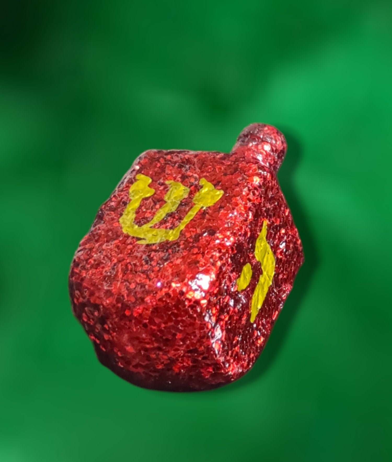 Ruby Glitter Dreidel — ruby red glittered wood dreidel with stand | Judaica Square Lakewood (view 3)