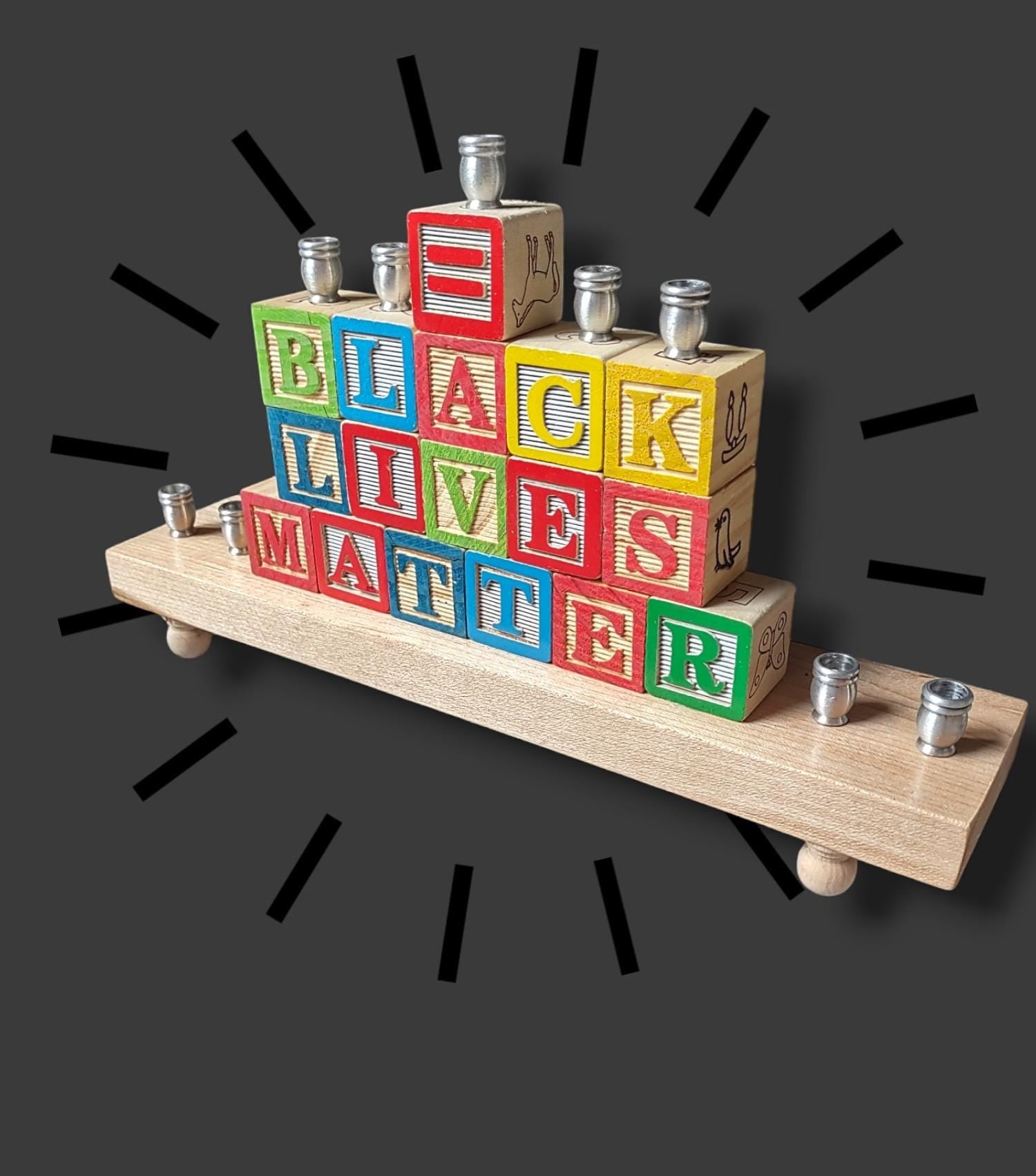 BLM block menorah — wooden letter blocks lined with aluminum candle cups | Judaica Square Lakewood (view 3)