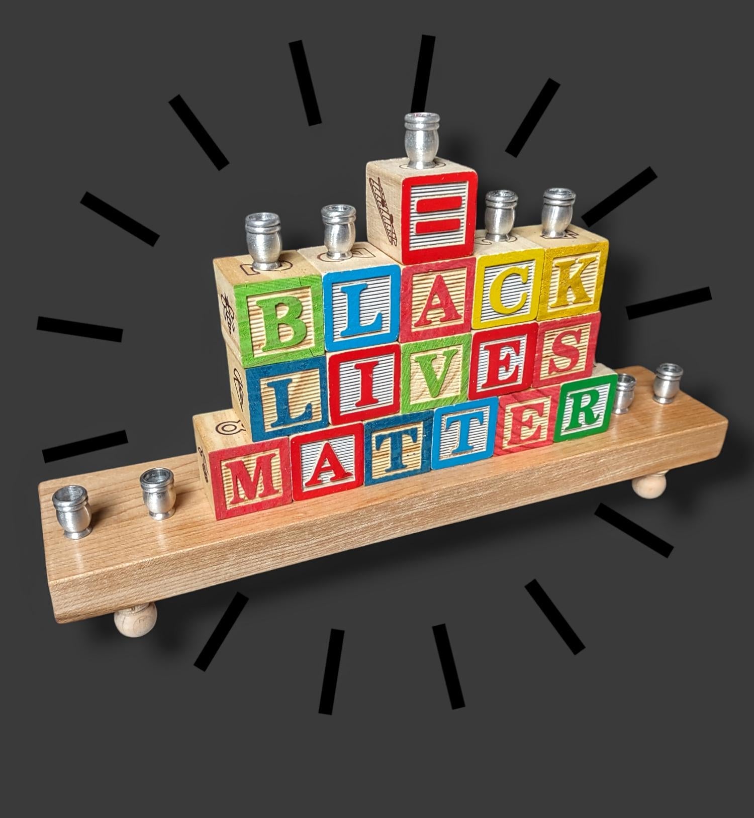 BLM block menorah — wooden letter blocks lined with aluminum candle cups | Judaica Square Lakewood (view 4)