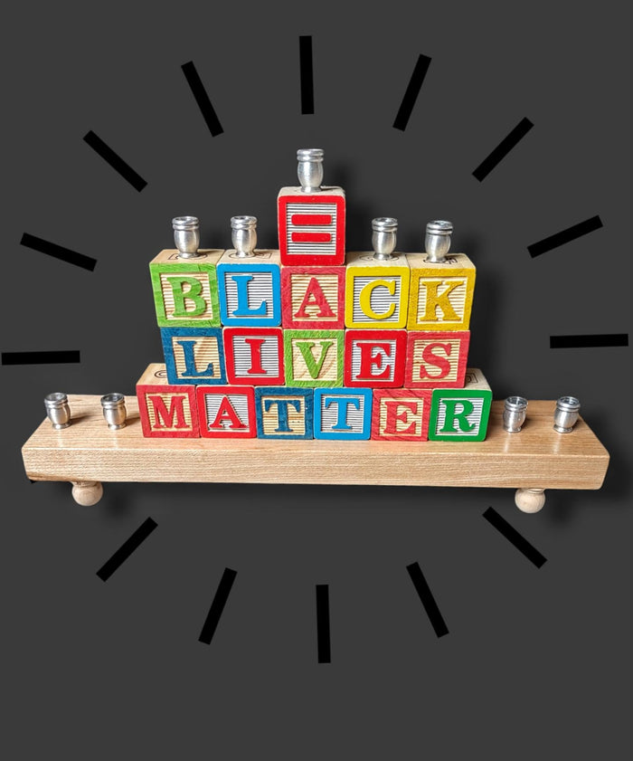 BLM block menorah — wooden letter blocks lined with aluminum candle cups | Judaica Square Lakewood