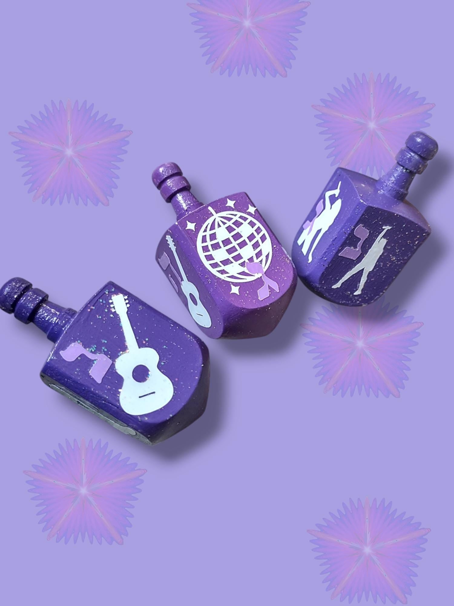 Swiftie Dreidel — purple glitter dreidel with Taylor Swift fan icons | Judaica Square Lakewood (view 2)