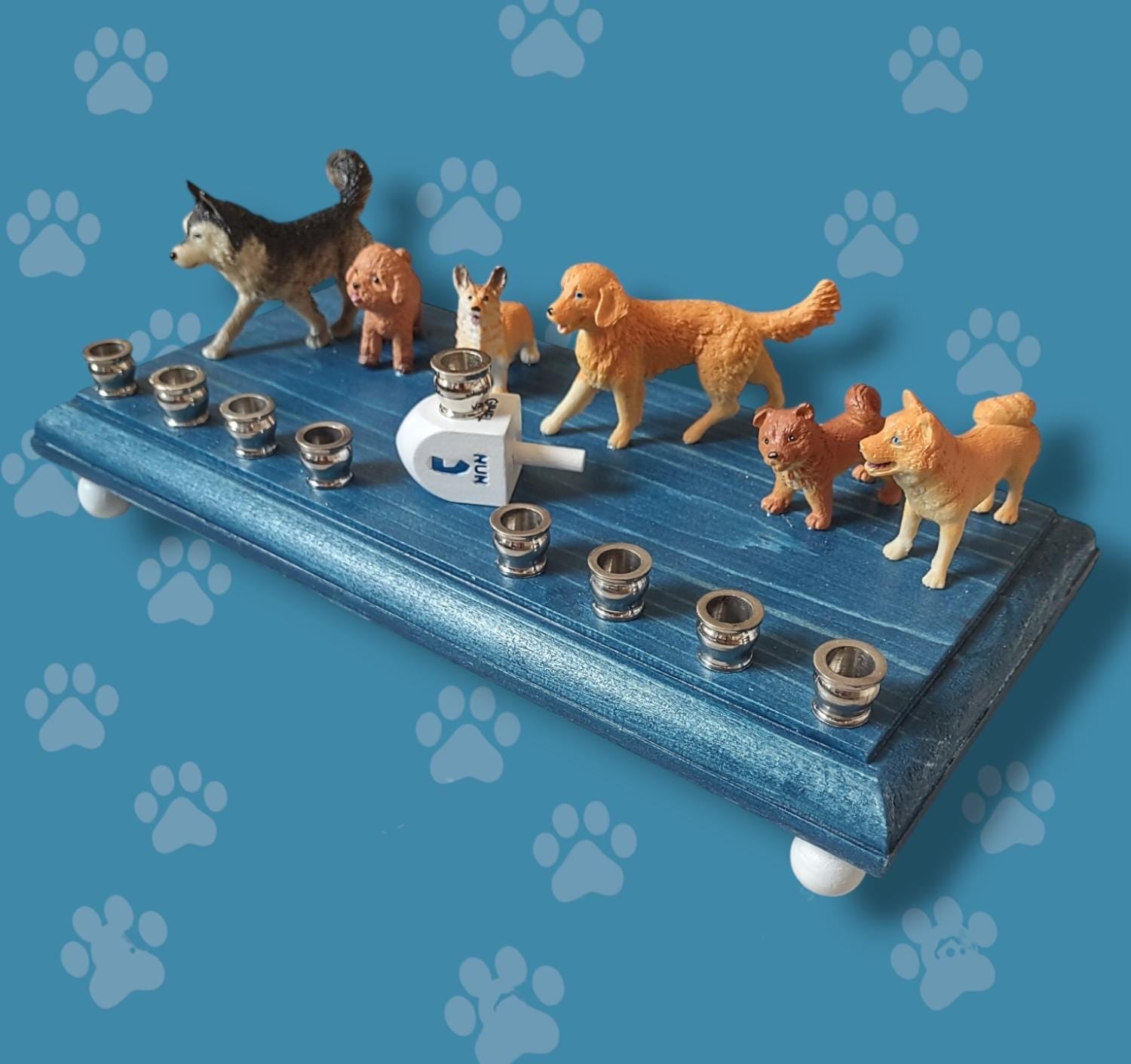 Dog breed menorah — row of painted dogs on a stained base with a paw print dreidel | Judaica Square Lakewood (view 3)