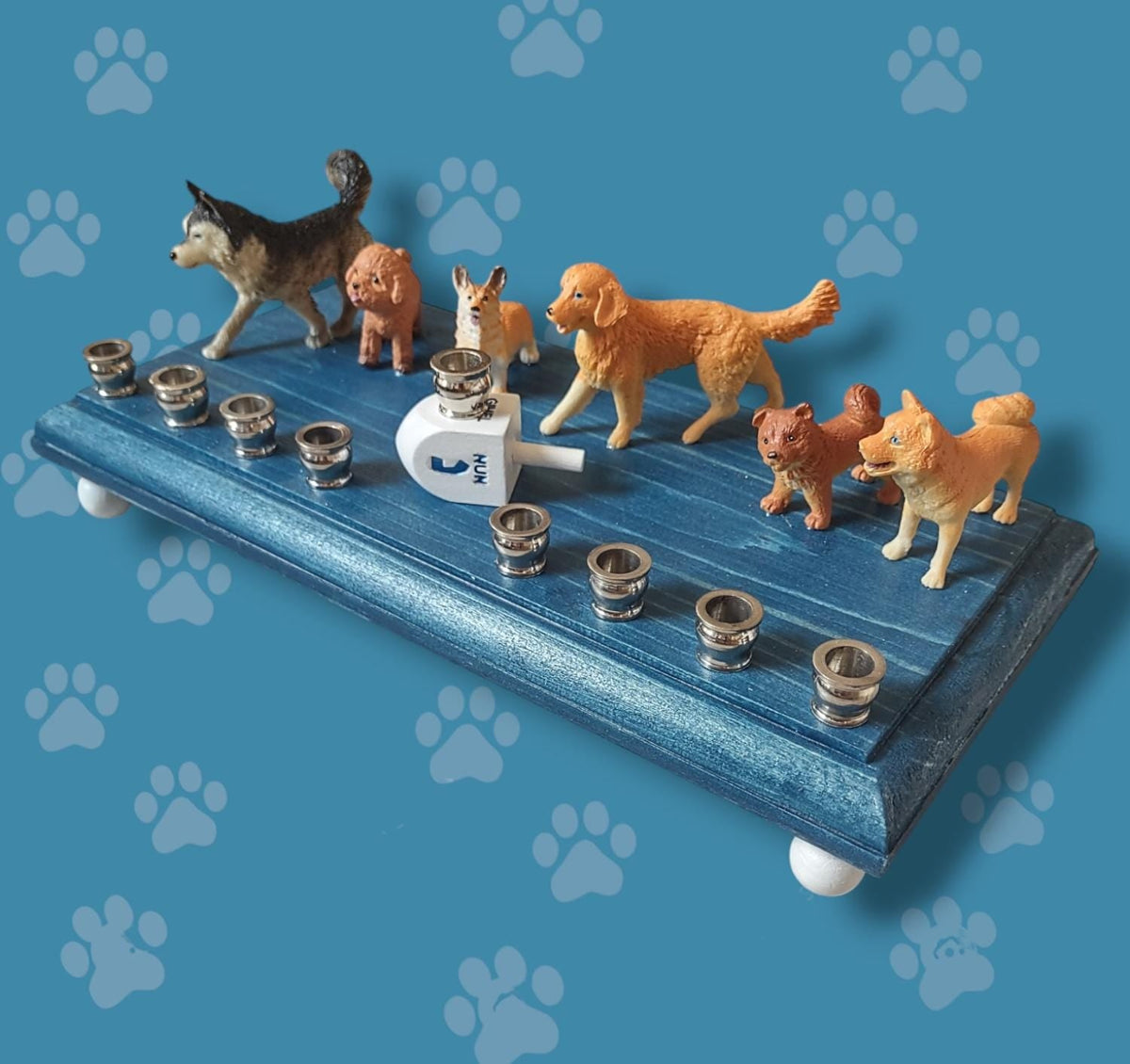 Dog breed menorah — row of painted dogs on a stained base with a paw print dreidel | Judaica Square Lakewood (view 3)