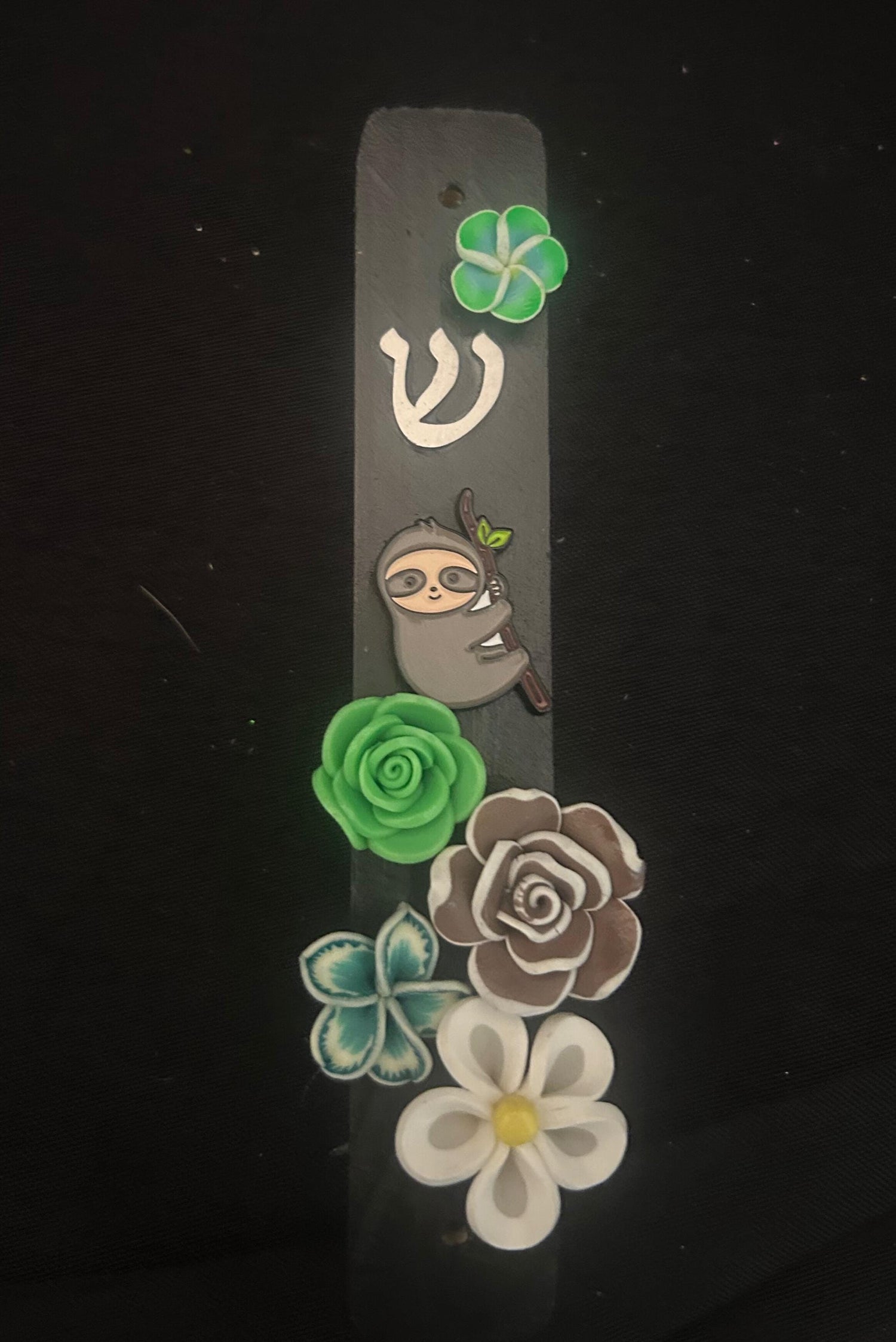 Sloth mezuzah case — wood with enamel sloth pin and polymer flowers | Judaica Square Lakewood (view 2)
