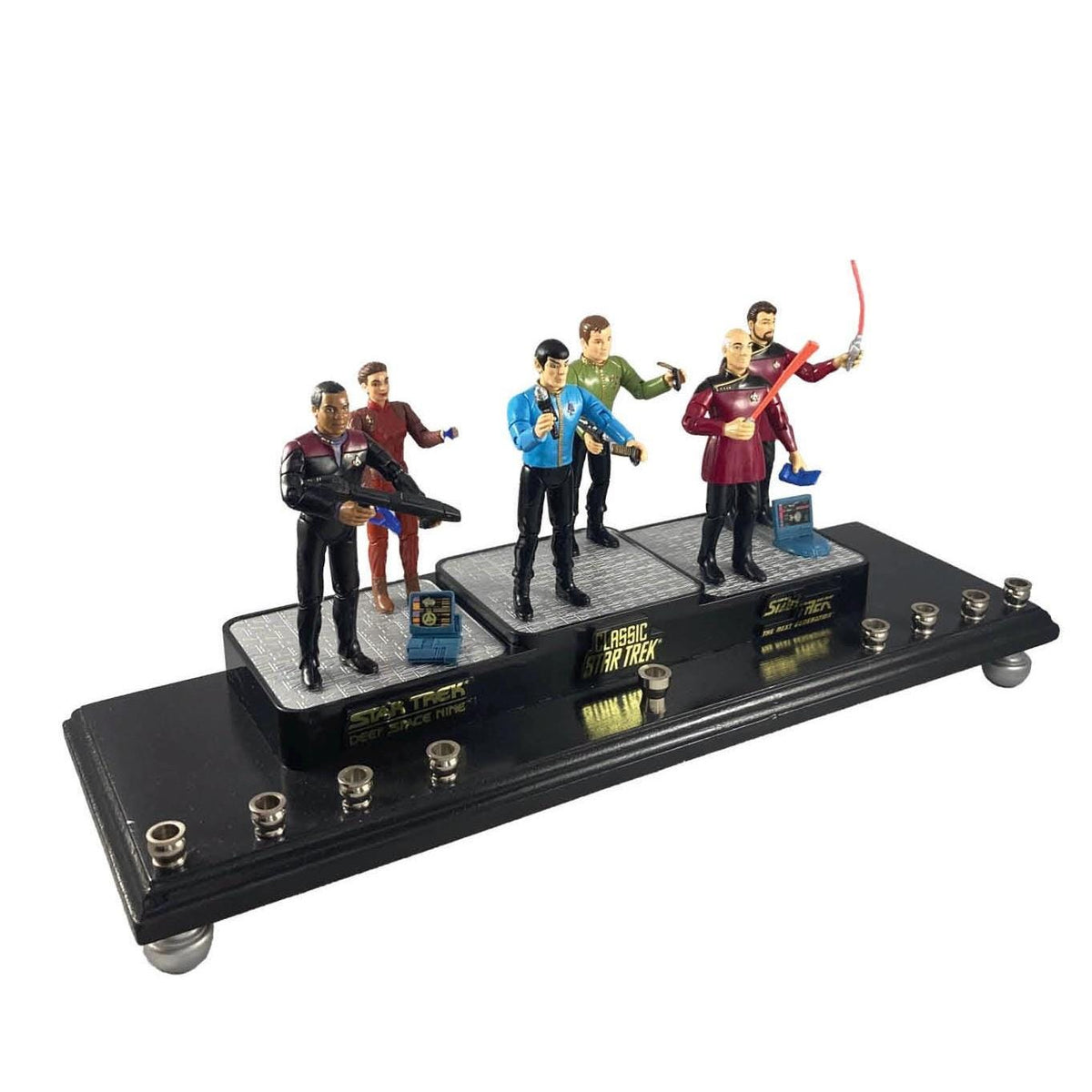 Star Trek collector menorah with six vintage character figures, angled view