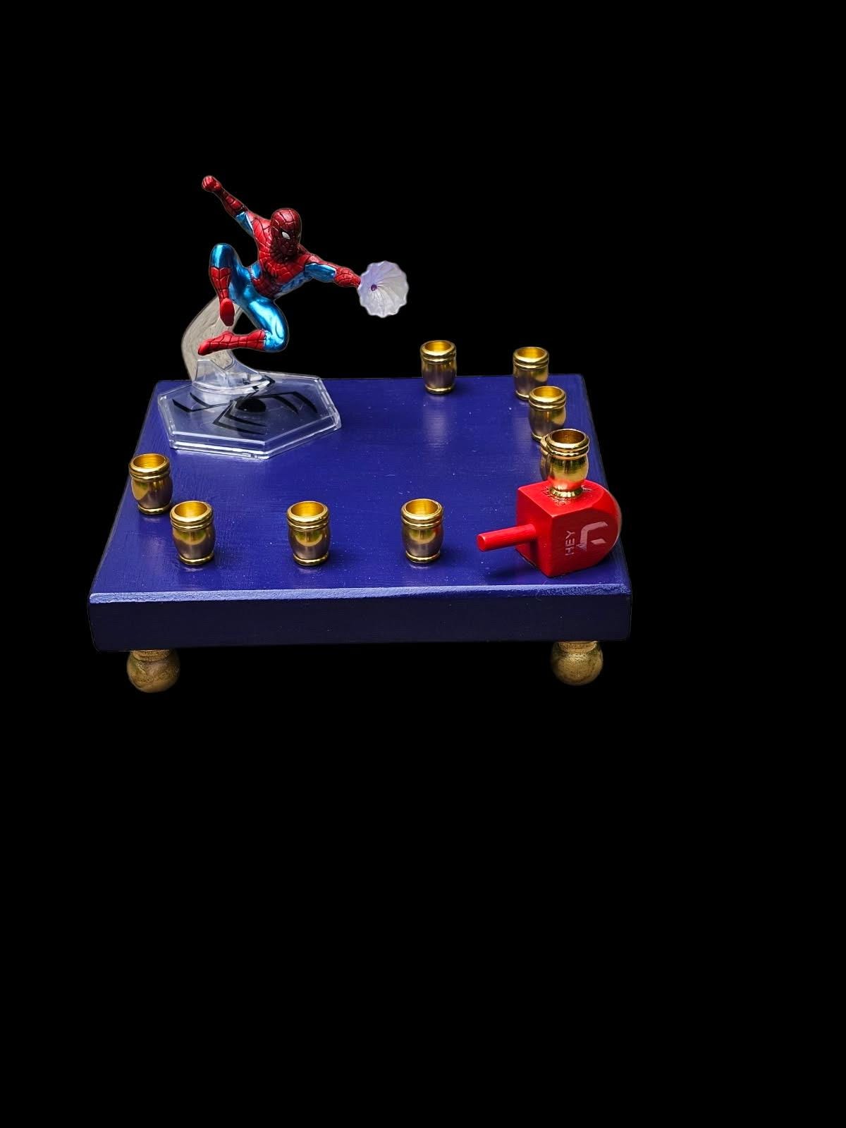 Spider-Man Menorah — red and blue Marvel figure on painted wood plaque | Judaica Square Lakewood (view 2)