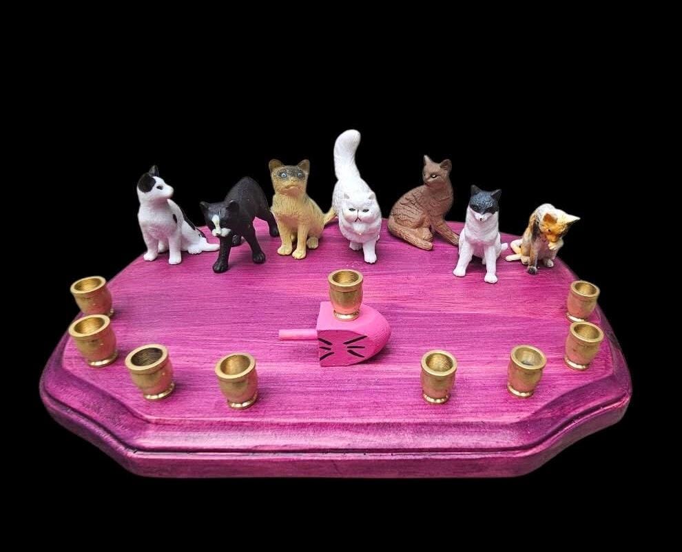 Cat menorah — kitty figures with pink whiskered dreidel on black cherry wood base | Judaica Square Lakewood (view 3)