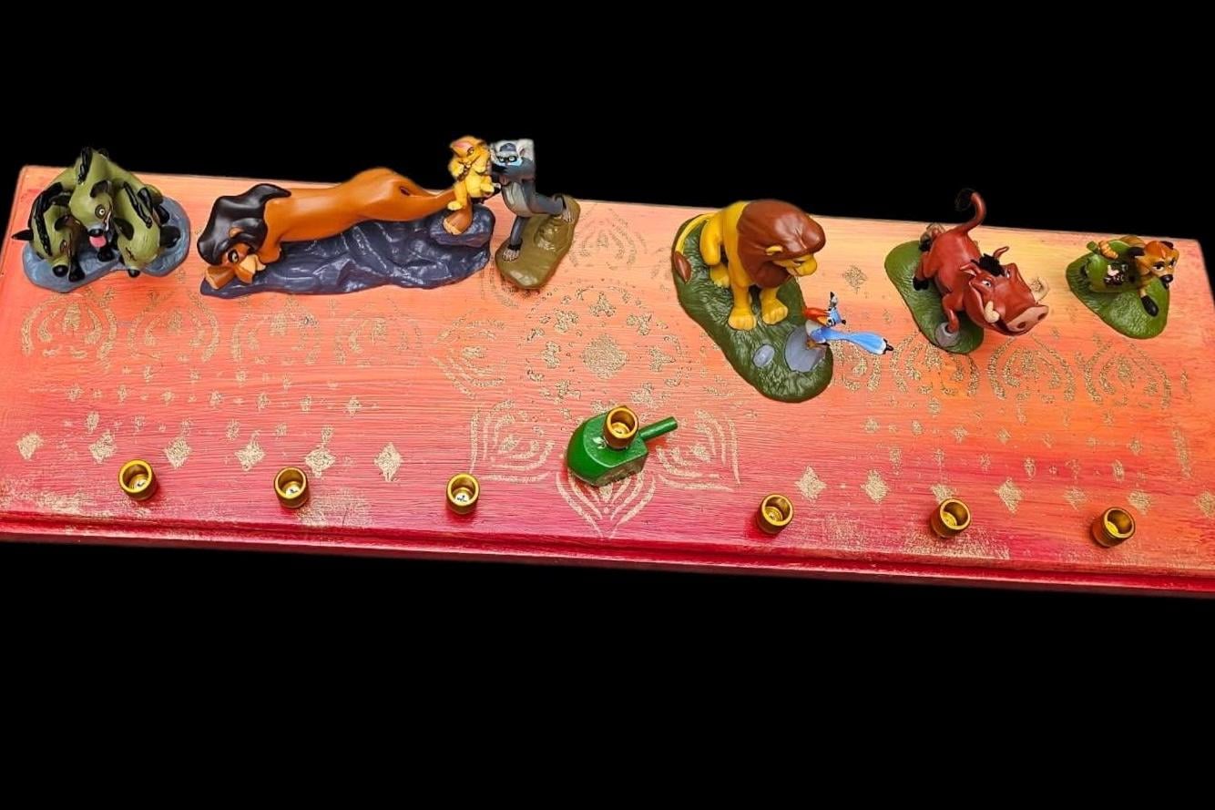 Lion King menorah — Mufasa and cubs on sunset mandala plaque with gold cups | Judaica Square Lakewood (view 3)