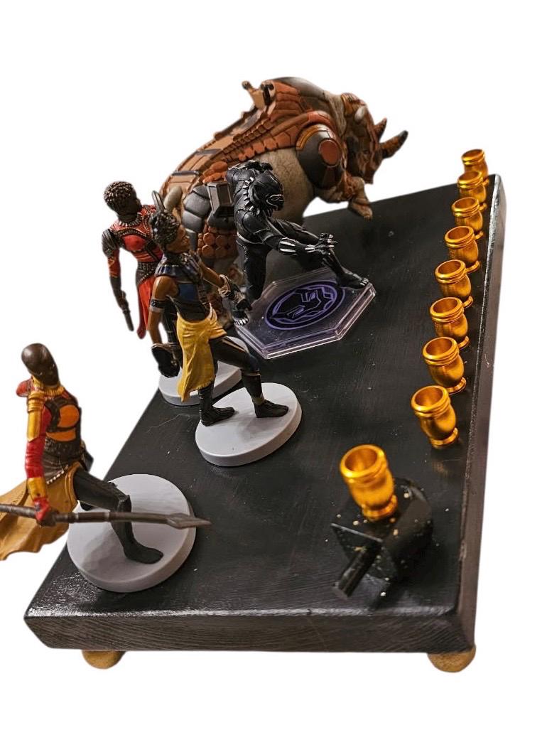 Black Panther menorah — Marvel figures on painted plaque with iridescent blue cups | Judaica Square Lakewood (view 3)